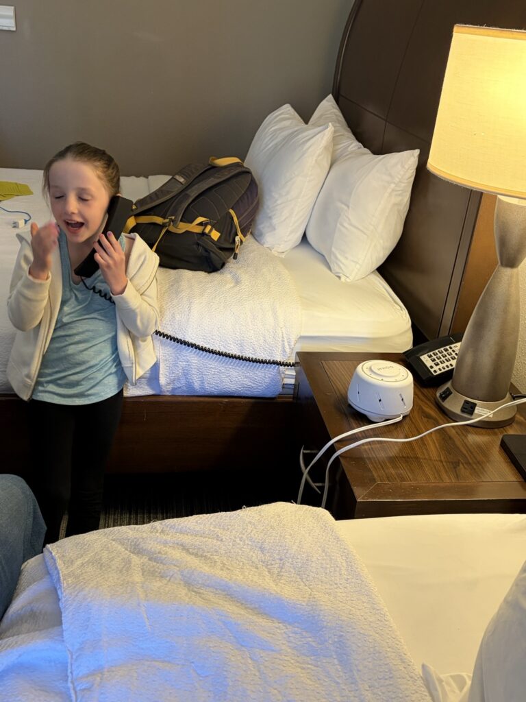 Mercy used the hotel room phone